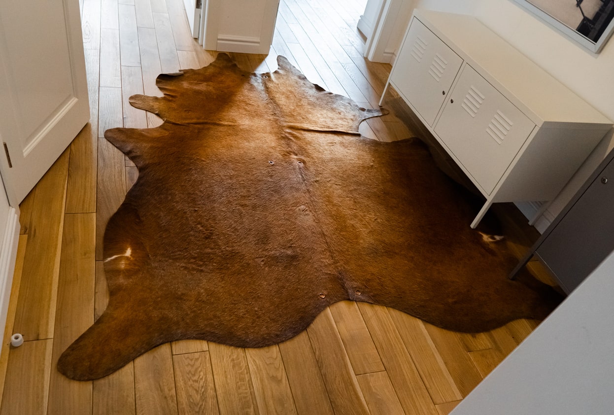 cowhide rug with stains